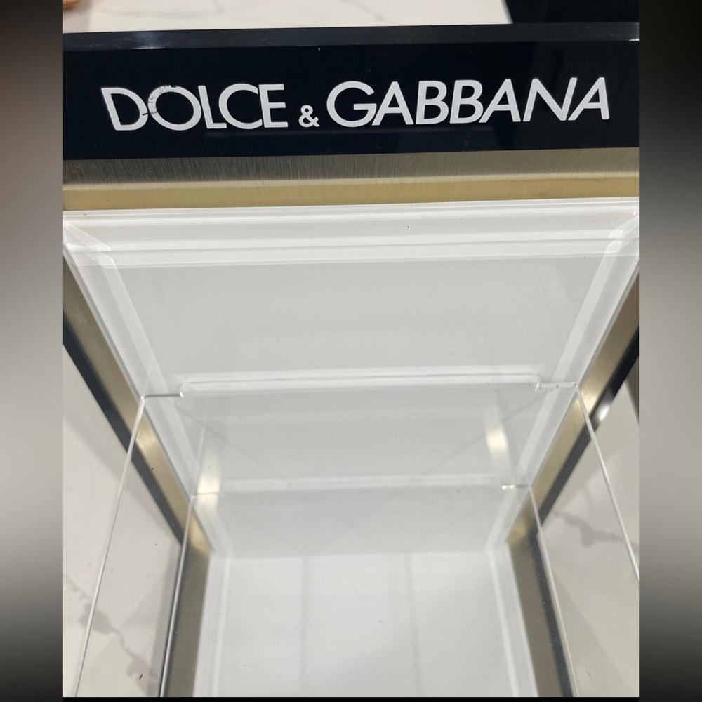 Dolce & Gabbana shelf display stand